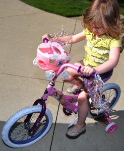 learning to ride her big girl bike