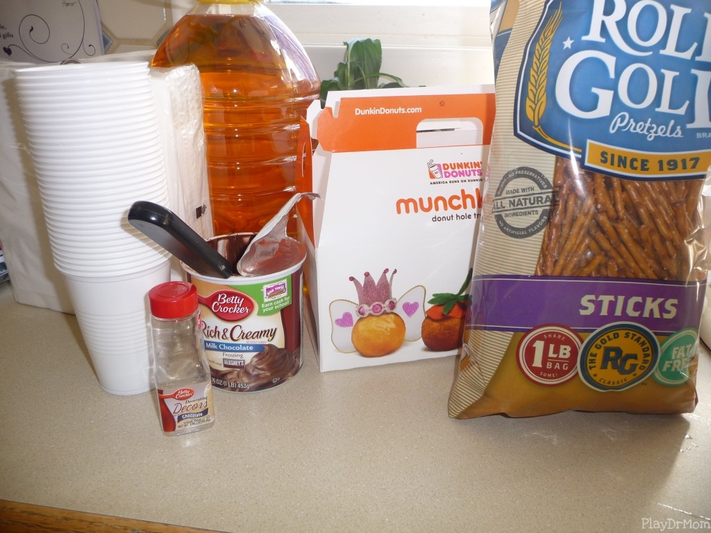 Ingredients Dunkin' Donut munkins, chocolate frosting, chocolate